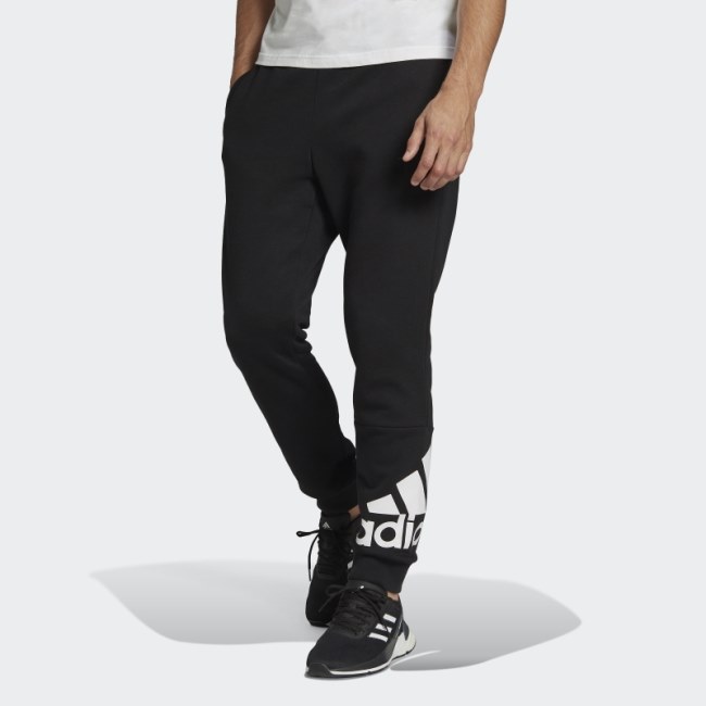 Essentials Fleece Tapered Cuff Logo Pants Adidas Black