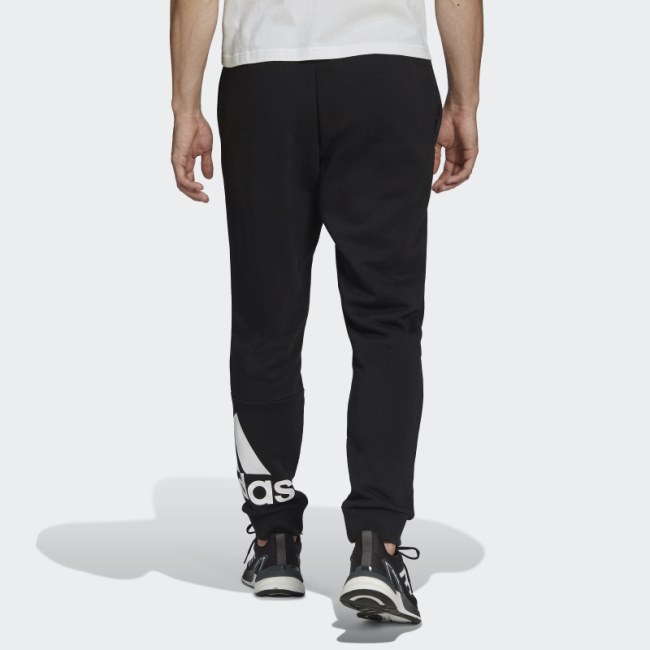 Essentials Fleece Tapered Cuff Logo Pants Adidas Black